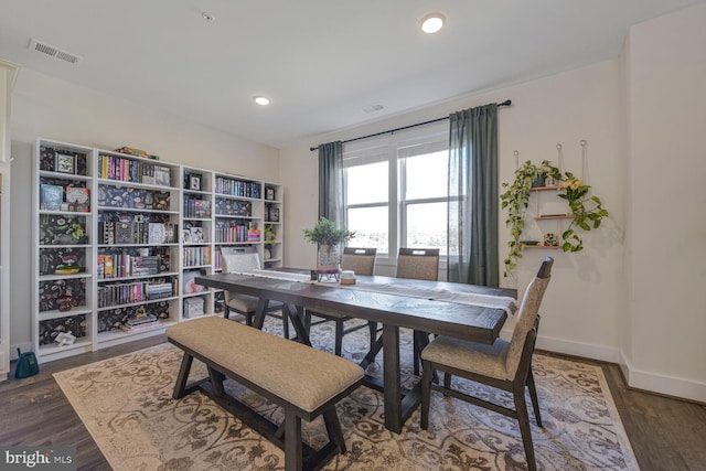 44878 Tiverton Sq, Ashburn, VA 20147 - dining room with wood finished floors, baseboards, and recessed lighting