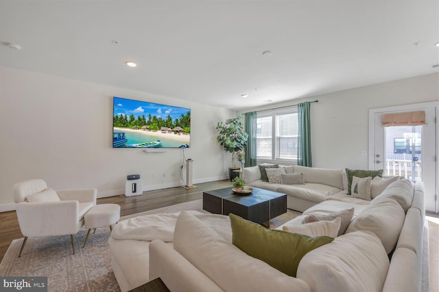 44878 Tiverton Sq, Ashburn, VA 20147 - living area with wood finished floors, baseboards, and recessed lighting