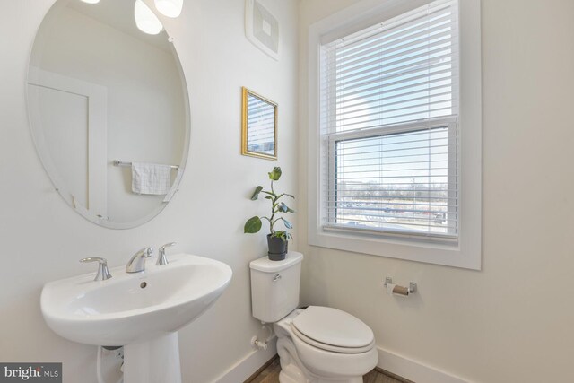 44878 Tiverton Sq, Ashburn, VA 20147 - bathroom with baseboards, plenty of natural light, and toilet