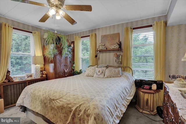1322 Brooke Blvd, Reading, PA 19607 - bedroom with wallpapered walls, light colored carpet, multiple windows, ornamental molding, and ceiling fan