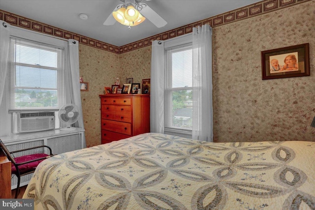 1322 Brooke Blvd, Reading, PA 19607 - bedroom with multiple windows, cooling unit, wallpapered walls, and a ceiling fan