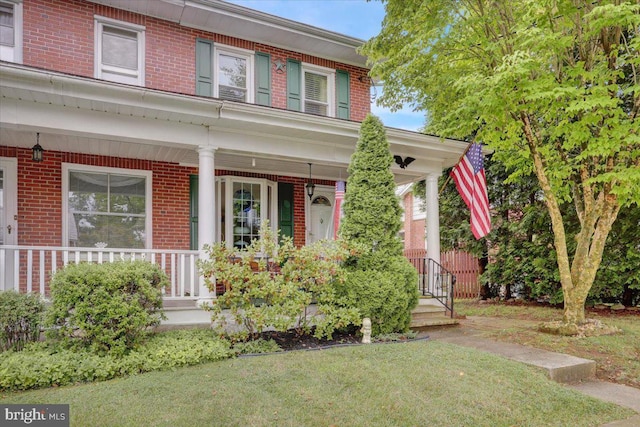 1322 Brooke Blvd, Reading, PA 19607 - view of front of home with brick siding and covered porch