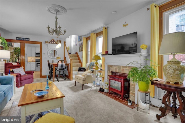 1322 Brooke Blvd, Reading, PA 19607 - carpeted living area with stairs and a wood stove