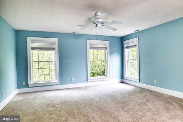 6153 Long Point Rd, Neavitt, MD 21652 - unfurnished room featuring baseboards, carpet, and ceiling fan