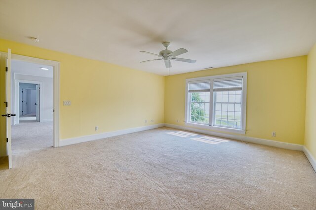 6153 Long Point Rd, Neavitt, MD 21652 - carpeted empty room featuring a ceiling fan, baseboards, and a smoke detector