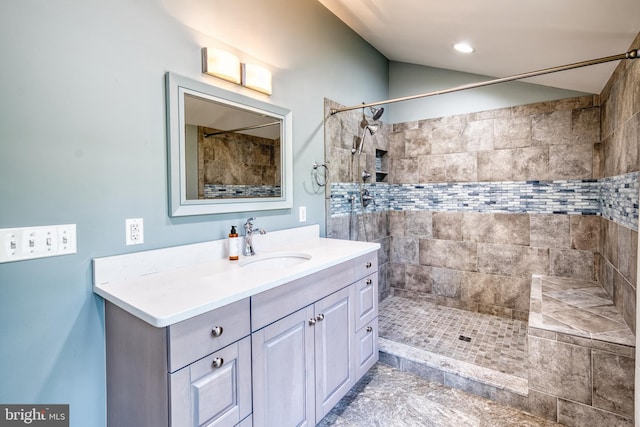 6153 Long Point Rd, Neavitt, MD 21652 - bathroom with vanity, tiled shower, and lofted ceiling