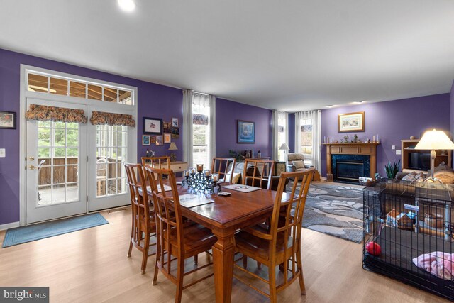 5631 Jordan Blvd, New Market, MD 21774 - dining area with wood finished floors and a glass covered fireplace