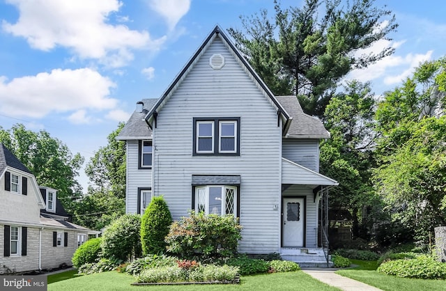 2942 Oley Turnpike Rd, Reading, PA 19606 - view of front facade featuring a front lawn, roof with shingles, and entry steps