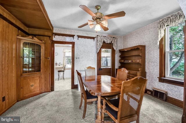 2942 Oley Turnpike Rd, Reading, PA 19606 - carpeted dining area featuring wallpapered walls, healthy amount of natural light, ceiling fan, a textured ceiling, and baseboards
