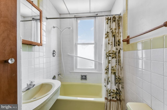 2942 Oley Turnpike Rd, Reading, PA 19606 - bathroom with tile walls, a sink, shower / bath combination with curtain, and toilet
