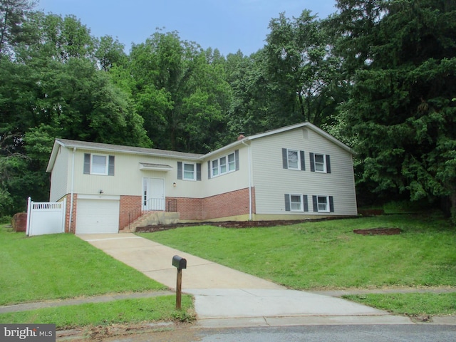 13 Pinyon Pine Cir, Wilmington, DE 19808 - raised ranch featuring brick siding, a garage, and concrete driveway