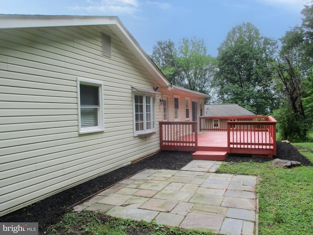 13 Pinyon Pine Cir, Wilmington, DE 19808 - rear view of house featuring a wooden deck and a patio