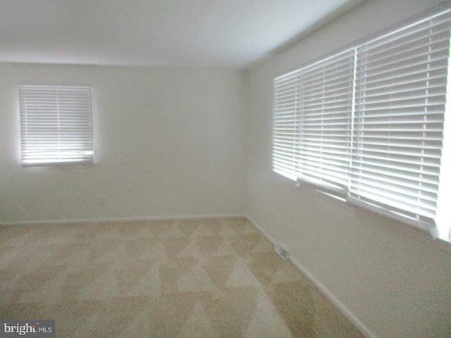 13 Pinyon Pine Cir, Wilmington, DE 19808 - spare room featuring light carpet and baseboards