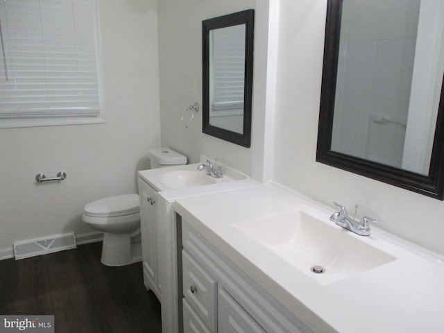 13 Pinyon Pine Cir, Wilmington, DE 19808 - bathroom with vanity, toilet, and wood finished floors