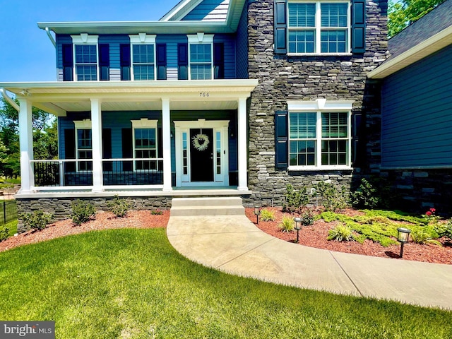 766 Chatelaine Ct, Eldersburg, MD 21784 - view of exterior entry with stone siding and a porch