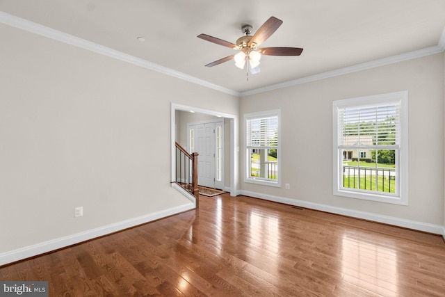 766 Chatelaine Ct, Eldersburg, MD 21784 - unfurnished room with wood finished floors, crown molding, a ceiling fan, and stairway
