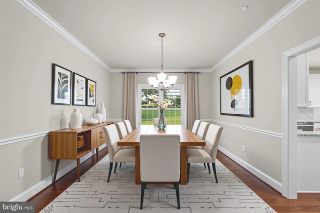 766 Chatelaine Ct, Eldersburg, MD 21784 - dining area with a chandelier, dark wood-style flooring, and ornamental molding