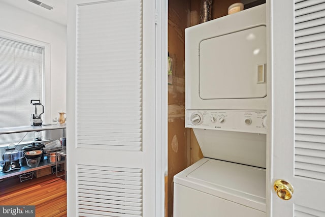 1413 Hopkins St NW, Washington, DC 20036 - washroom featuring stacked washer / dryer