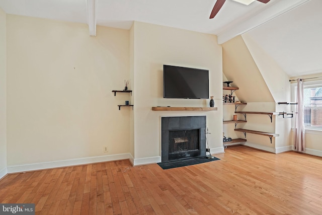 1413 Hopkins St NW, Washington, DC 20036 - unfurnished living room featuring hardwood / wood-style flooring, a ceiling fan, a fireplace, and baseboards
