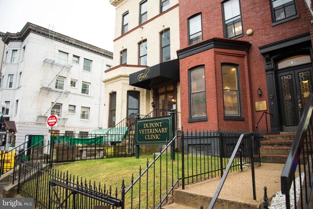 1413 Hopkins St NW, Washington, DC 20036 - view of exterior entry featuring brick siding
