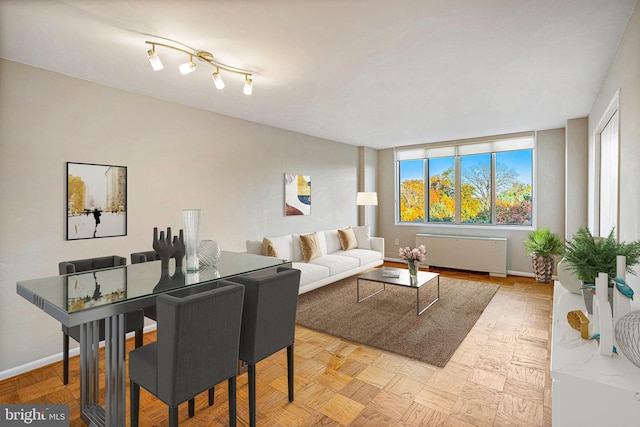 2939 Van Ness St NW Unit 1144, Washington, DC 20008 - living area with radiator heating unit and baseboards