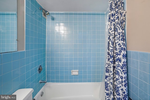 2939 Van Ness St NW Unit 1144, Washington, DC 20008 - full bathroom with shower / bathtub combination with curtain, tile walls, and toilet
