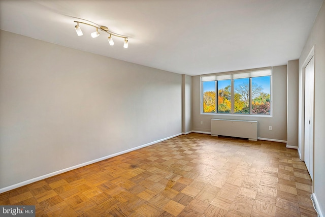2939 Van Ness St NW Unit 1144, Washington, DC 20008 - spare room featuring radiator and baseboards