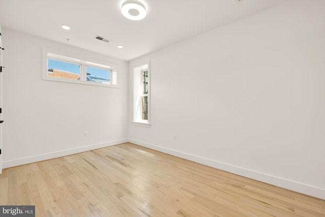 4335 Harrison St NW Unit 2, Washington, DC 20015 - empty room with light wood-style flooring, baseboards, and recessed lighting