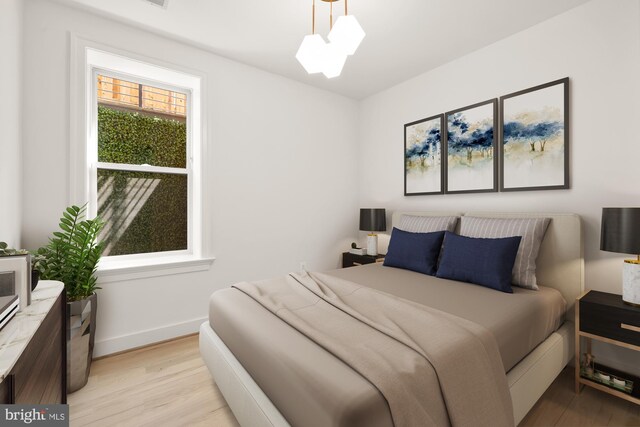 4335 Harrison St NW Unit 2, Washington, DC 20015 - bedroom featuring light wood-style flooring and baseboards