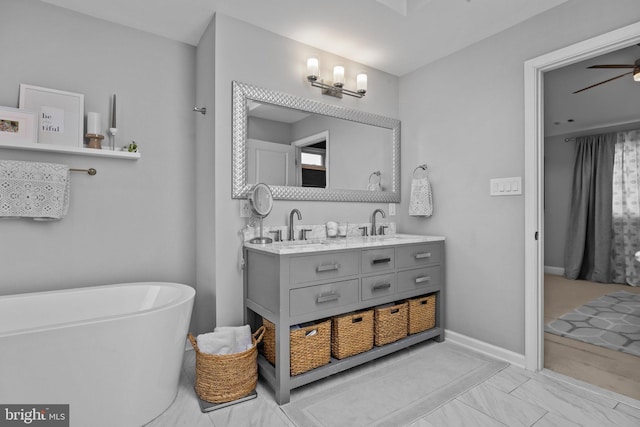 2 Woodfern Ave, Ewing, NJ 08628 - full bath with double vanity, a freestanding tub, a ceiling fan, and marble finish flooring