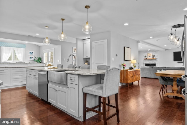 2 Woodfern Ave, Ewing, NJ 08628 - kitchen featuring dishwasher, recessed lighting, a center island with sink, dark wood-style floors, and open floor plan