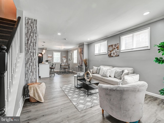 3812 Midheights Rd, Baltimore, MD 21215 - living room with baseboards, stairs, recessed lighting, radiator heating unit, and wood finished floors