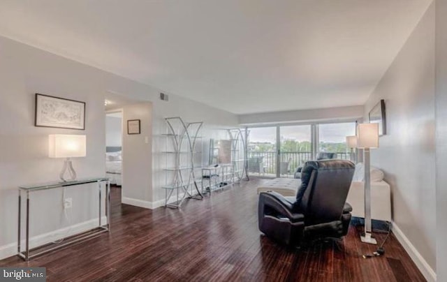 1300 Army Navy Dr Unit 803, Arlington, VA 22202 - sitting room featuring wood finished floors and baseboards