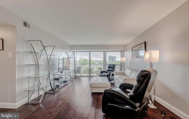 1300 Army Navy Dr Unit 803, Arlington, VA 22202 - living room with baseboards and dark wood-style flooring