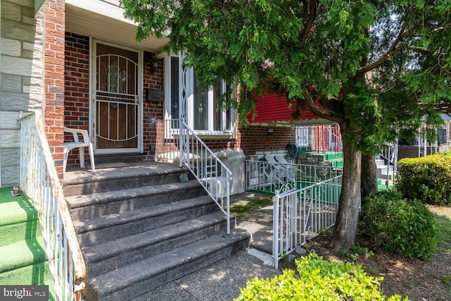 8627 Gilbert St, Philadelphia, PA 19150 - view of exterior entry featuring brick siding