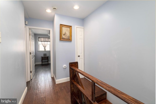 8627 Gilbert St, Philadelphia, PA 19150 - hallway with baseboards, an upstairs landing, dark wood-style flooring, and recessed lighting
