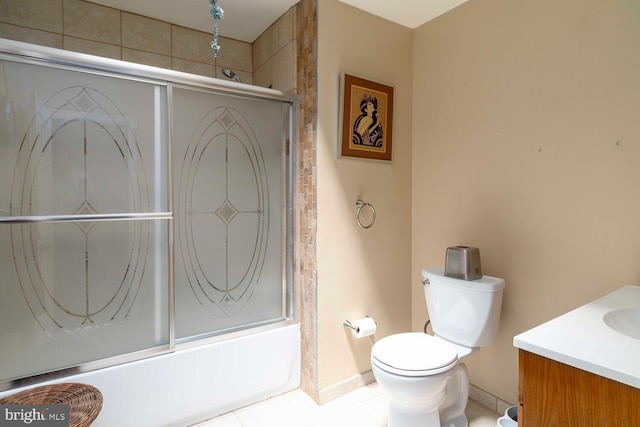 8627 Gilbert St, Philadelphia, PA 19150 - full bath featuring toilet, vanity, shower / bath combination with glass door, baseboards, and tile patterned flooring