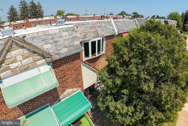 8627 Gilbert St, Philadelphia, PA 19150 - exterior view of brick siding