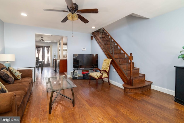 8627 Gilbert St, Philadelphia, PA 19150 - living area with ceiling fan, stairs, wood finished floors, baseboards, and recessed lighting