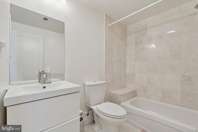 1537 S 2nd St, Philadelphia, PA 19147 - full bathroom featuring vanity, toilet, washtub / shower combination, and tile patterned flooring