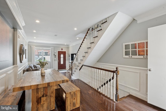1537 S 2nd St, Philadelphia, PA 19147 - foyer with a decorative wall, crown molding, wood finished floors, a wainscoted wall, and stairs