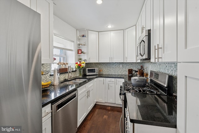 1537 S 2nd St, Philadelphia, PA 19147 - kitchen with stainless steel appliances, a sink, white cabinets, dark wood-style floors, and recessed lighting
