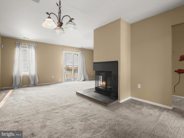 7677 E Arbory Ct Unit 231, Laurel, MD 20707 - unfurnished living room with carpet flooring, baseboards, a multi sided fireplace, and a chandelier