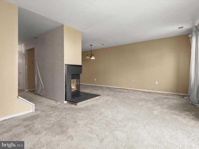 7677 E Arbory Ct Unit 231, Laurel, MD 20707 - unfurnished living room with carpet, a multi sided fireplace, and baseboards