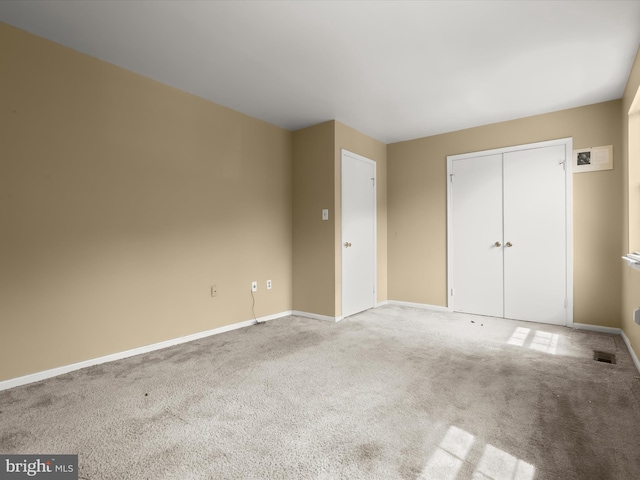 7677 E Arbory Ct Unit 231, Laurel, MD 20707 - unfurnished bedroom featuring carpet, baseboards, and a closet