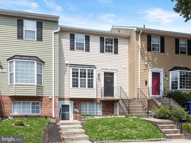 7677 E Arbory Ct Unit 231, Laurel, MD 20707 - view of property with a front lawn