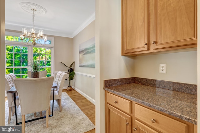 1650 Colonial Hills Dr, Mclean, VA 22102 - dining area with ornamental molding, wood finished floors, and a chandelier