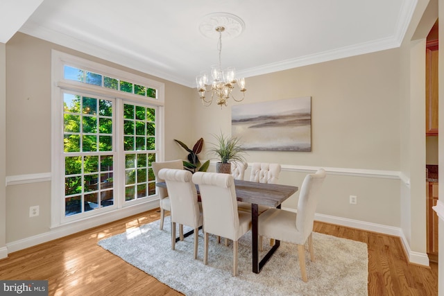 1650 Colonial Hills Dr, Mclean, VA 22102 - dining space with a chandelier, wood finished floors, and ornamental molding