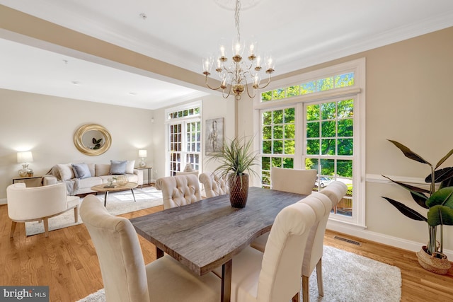 1650 Colonial Hills Dr, Mclean, VA 22102 - dining space featuring a chandelier, ornamental molding, and light wood-type flooring