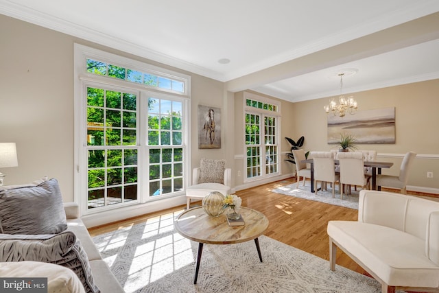 1650 Colonial Hills Dr, Mclean, VA 22102 - living room with crown molding, a chandelier, and wood finished floors